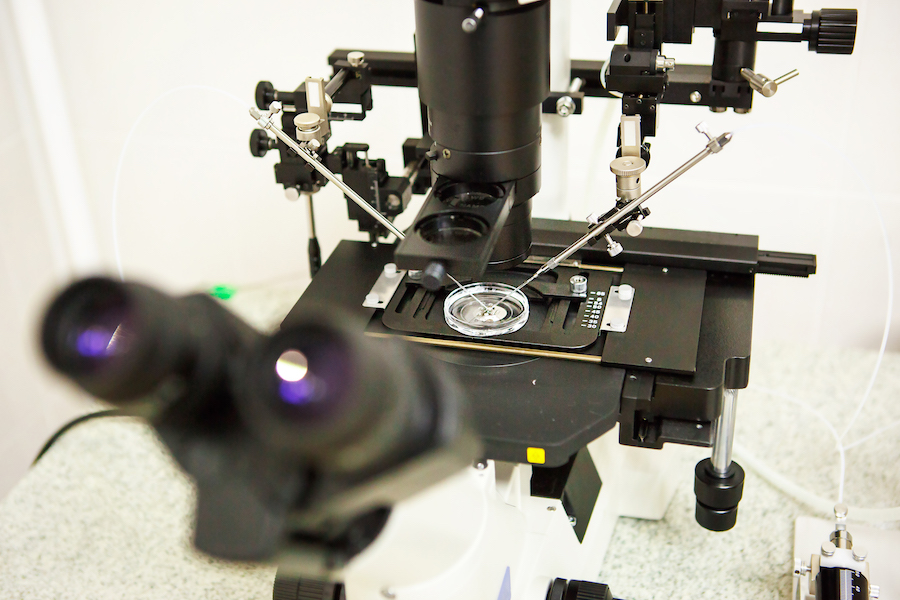 Microscope and optical equipment in the laboratory of the artificial insemination clinic. The invention of the vaccine, IVF. Tests, fertilization of the egg.